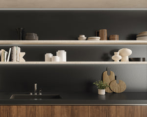 The dark, leathered finish of the fine porcelain is the ideal backdrop for showcasing items of whites and natural wood. See the full slab near me. 