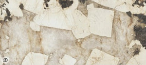 Bookmatch pattern of white and beige and brown shapes on a textured background in stock in Edmonton Western Canada