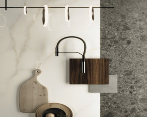 Porcelain slabs for backsplashes, countertops, showers, bathroom walls, fireplaces, feature walls, washbasins, custom furniture, high traffic flooring and facades.