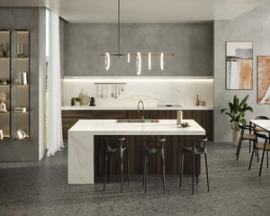 This beautifully designed, custom waterfall island offers an asymmetrical look, creating a focal centerpiece in this residential kitchen. Visit the showroom near me. 