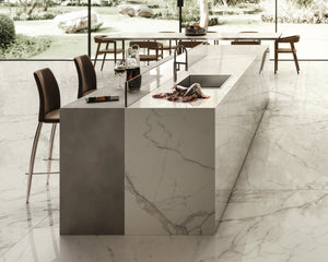 Porcelain slabs for backsplashes, countertops, showers, bathroom walls, fireplaces, feature walls, washbasins, custom furniture, high traffic flooring and facades.