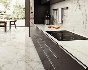 Porcelain slabs for backsplashes, countertops, showers, bathroom walls, fireplaces, feature walls, washbasins, custom furniture, high traffic flooring and facades.