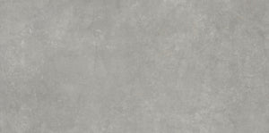 Solid grey replicates cement porcelain countertop and large format tile