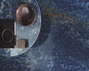 Porcelain slabs for backsplashes, countertops, showers, bathroom walls, fireplaces, feature walls, washbasins, custom furniture, high traffic flooring and facades.