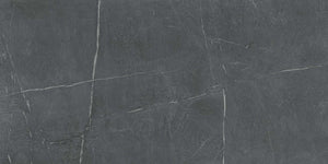 In Stock porcelain slab in dark gray stone surface with textures that look like soapstone but is a porcelain large format tile.