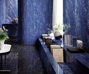 The dark marble look floor is exquisite in this unique space featuring high quality large format porcelain tile. The supplier is near me in Edmonton, Alberta. 