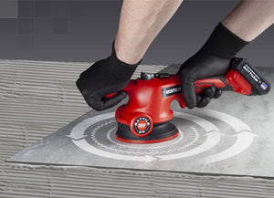 Man using Montolit tool on floor showing vibration pattern in a round circle.