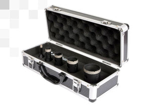 Five Mondrillo Diamond Core Drill Bits, standing with the diamond edge up in a black and steel Mondrillo case.