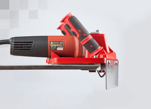 Toprofile , tile beveling machine, by Montolit, red in color and has two handles, beveling a large format tile.